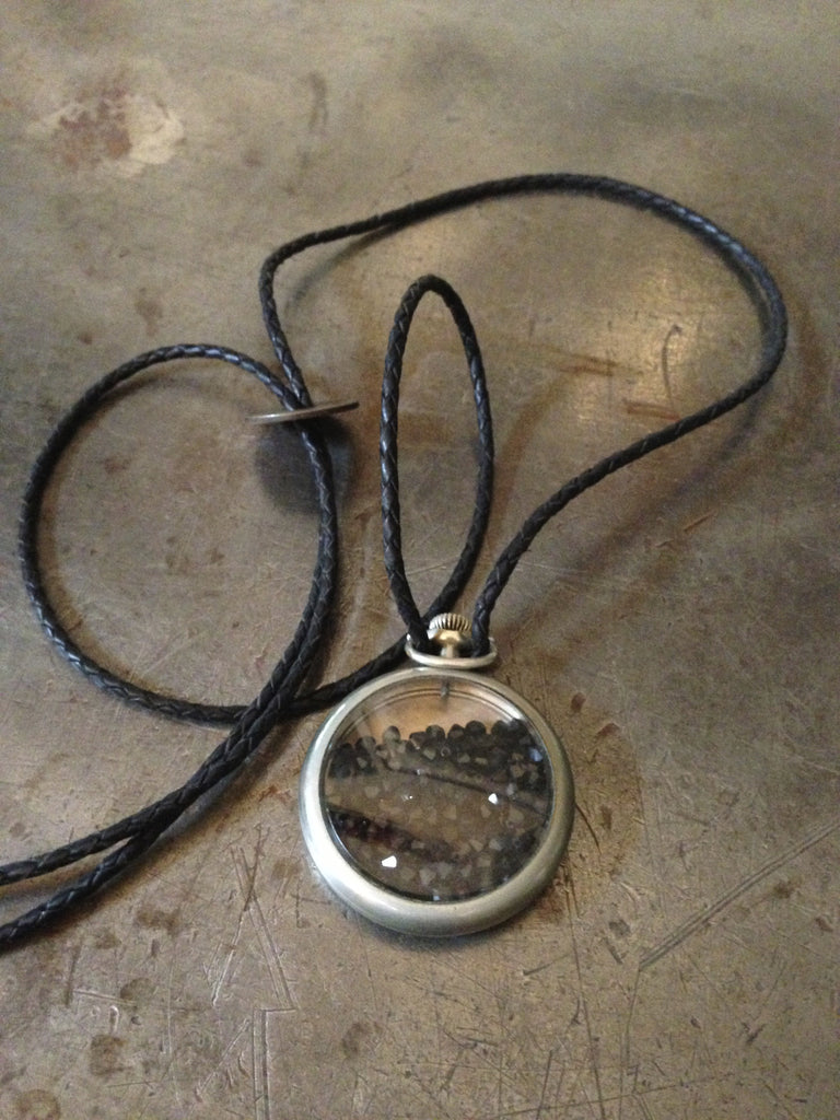Vintage silveroid pocket watch with black Swarovski crystals on adjustable braided black leather with vintage coin closre necklace