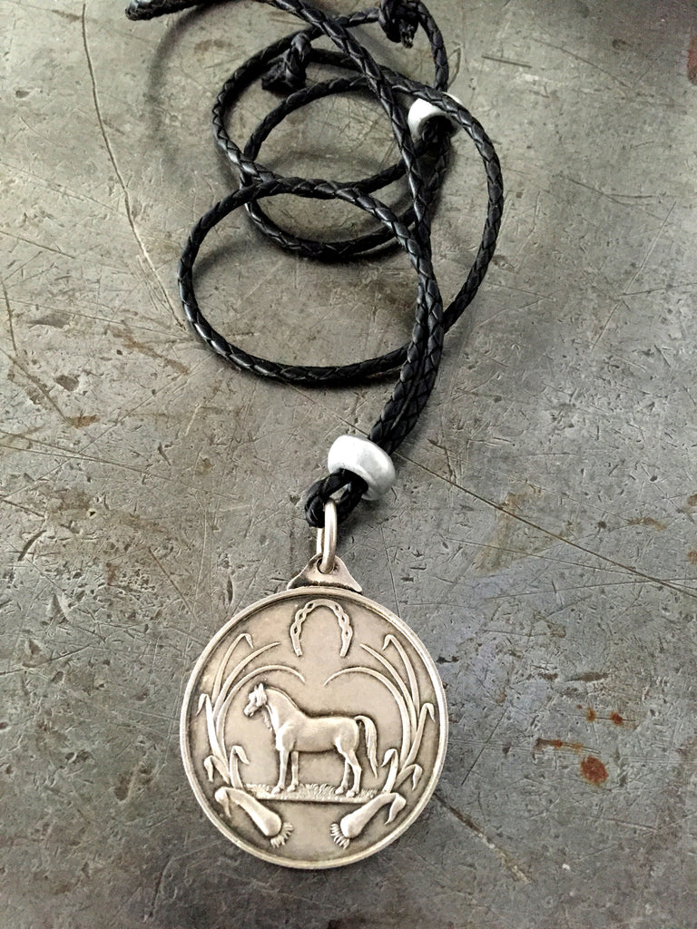 Vintage large sterling silver hallmarked horse medal on adjustable braided leather necklace