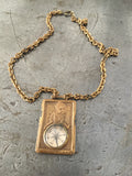 Vintage brass compass advertising fob on vintage brass chains