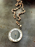 Vintage large double sided compass fob on vintage Rosary seed bead necklace.