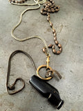 Vintage referee whistle with original leather piece on gold muff chain a WW1/WW2 brass rosary bead necklace