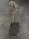 Vintage silver Victorain mesh purse with silver dog clip on vintage silver long muff chain necklace